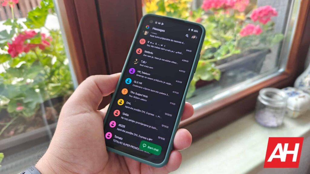 Smartphone display showing chat messages in Google Messages