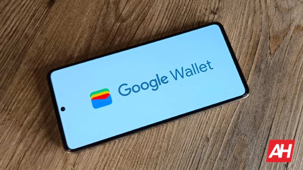 Smartphone displaying payment cards stacked vertically in the Google Wallet app on Android